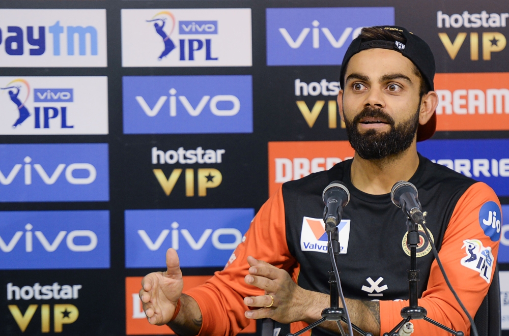 A skipper of the Indian Cricket team and the Royal Challengers Bangalore (RCB) IPL team Virat Kohli, gestures as he addresses a press conference for the Indian Premier League (IPL) season, in Chennai on March 22, 2019. GETTYOUT / AFP / ARUN SANKAR