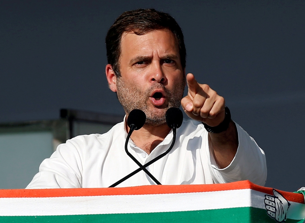 Rahul Gandhi, President of India's main opposition Congress party, addresses his party's supporters during a public meeting in Gandhinagar, Gujarat, India, March 12, 2019. Reuters/Amit Dave