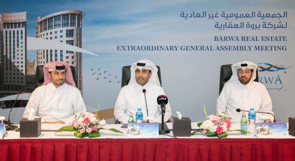 Issa bin Mohammed Al Mohannadi (centre), Vice-Chairman and Managing Director of Barwa Real Estate Company, and other board members at the company’s EGM, held in Doha, yesterday.