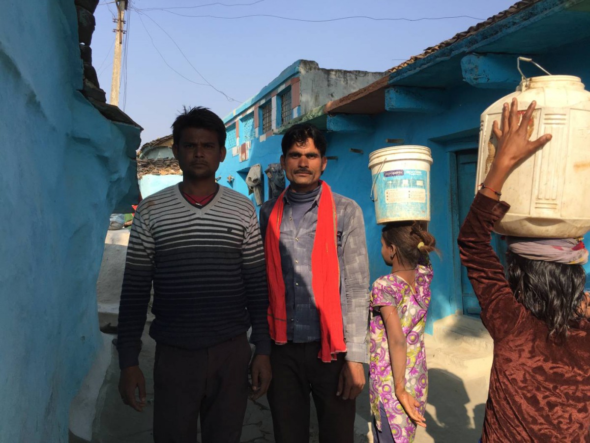 Jagdish Ahirwal (R) stands with a friend in Sunwaha village of Madhya Pradesh, India, December 12, 2018. Thomson Reuters Foundation/Roli Srivastava