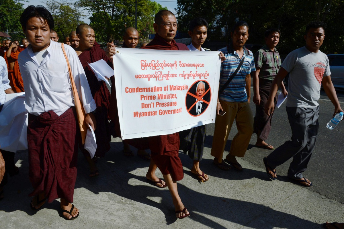 A Myanmar Buddhist monk group stage a protest outside the Malaysian embassy in Yangon on December 3, 2016. AFP/Romeo Gacad
