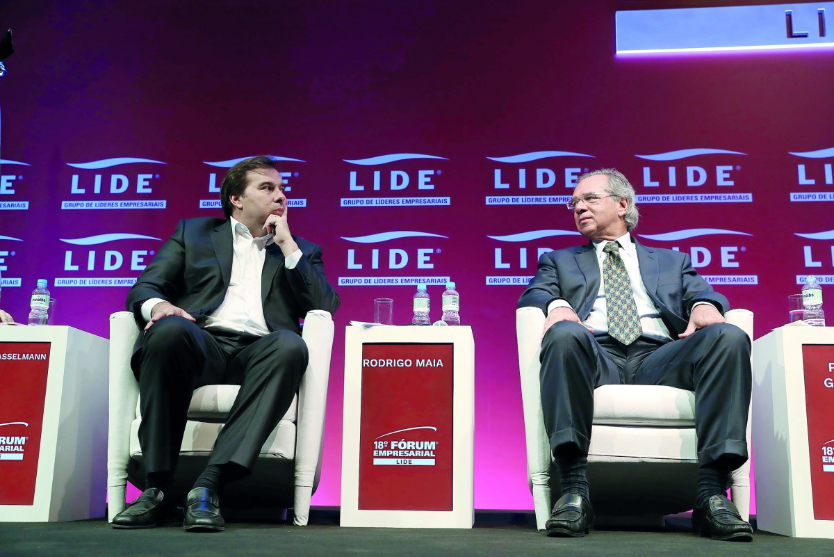 President of the Chamber of Deputies Rodrigo Maia and Brazil's Economy Minister Paulo Guedes are seen during a meeting of the LIDE (Businessmen Leaders Group) in Campos do Jordao, Brazil, April 5, 2019. Reuters/Amanda Perobelli