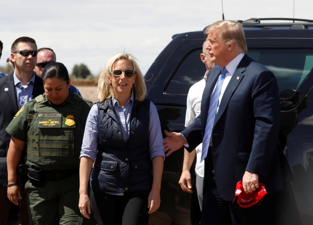 Homeland Security Secretary Kirstjen Nielsen and U.S. President Donald Trump arrive to view a section of border wall in Calexico California, U.S., April 5, 2019. Picture taken April 5, 2019. REUTERS/Kevin Lamarque