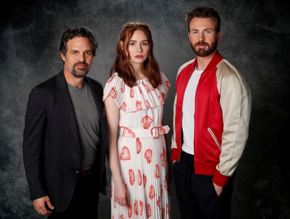Cast members Mark Ruffalo (L), Karen Gillan and Chris Evans pose for a portrait while promoting the film 