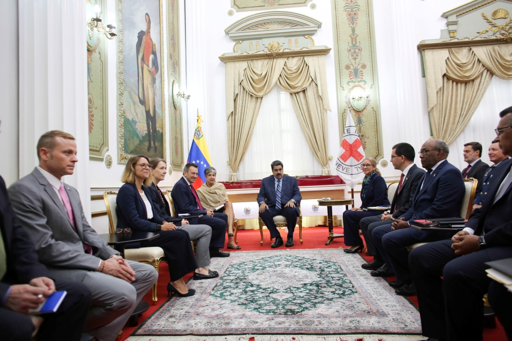 Venezuela's President Nicolas Maduro and Peter Maurer, president of the International Committee of the Red Cross (ICRC), attend a meeting at Miraflores Palace in Caracas, Venezuela April 9, 2019. Miraflores Palace/Handout via REUTERS 