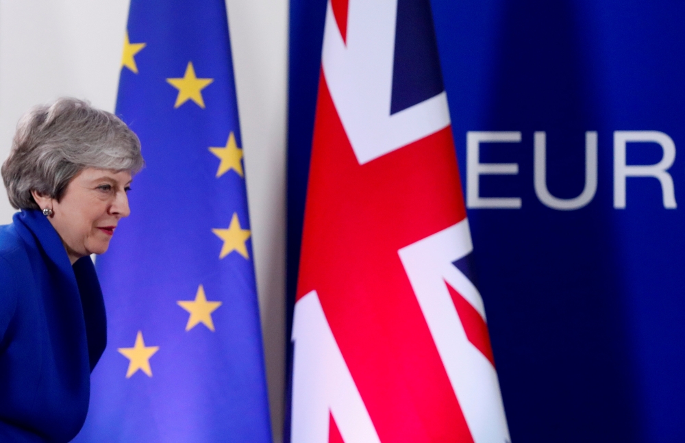British Prime Minister Theresa May leaves after holding a news conference following an extraordinary European Union leaders summit to discuss Brexit, in Brussels, Belgium April 11, 2019. REUTERS/Susana Vera 