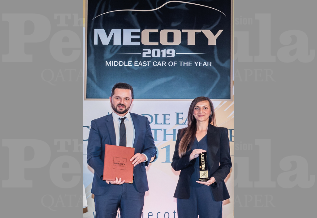 Officials with the award.