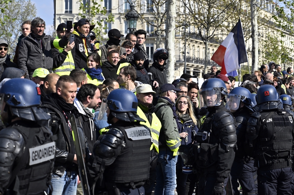 Yellow vests (Gilets jaunes) protesters gather on the Place de la Republique during the 'Act 22’ demonstration (the 22nd consecutive Saturday national protest) in Paris, France on April 13, 2019. Mustafa Yalç?n - Anadolu
