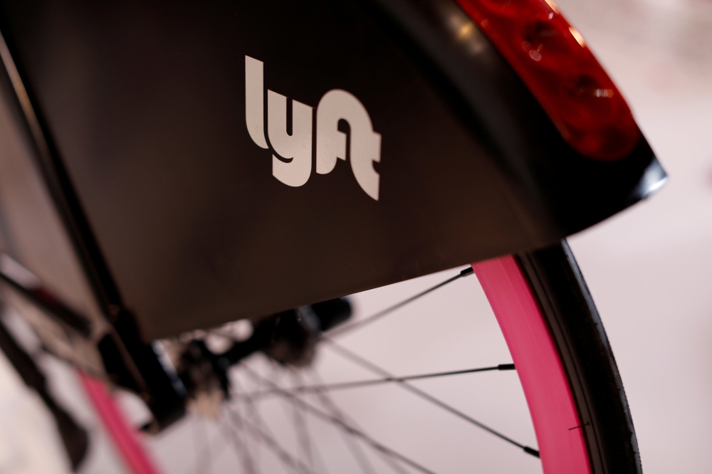 A Lyft bicycle is shown at the Lyft listing on the Nasdaq during an IPO event in Los Angeles, California, March 29, 2019. Reuters/Mike Blake