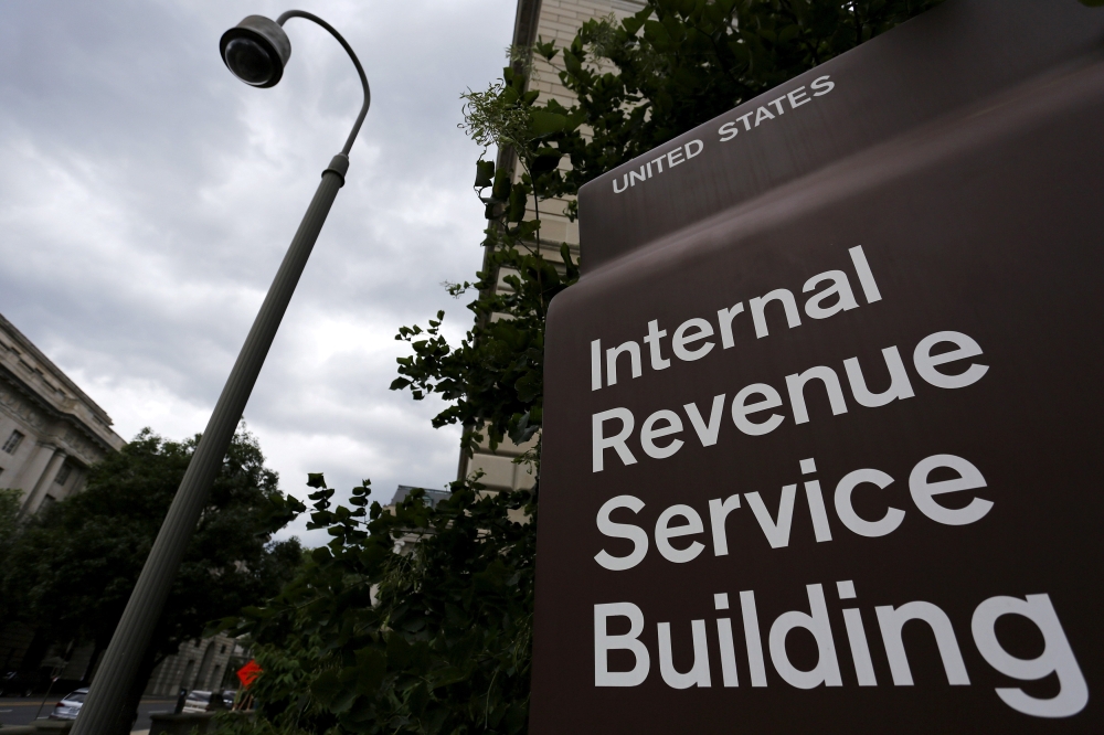 A security camera hangs near a corner of the US Internal Revenue Service -IRS- building in Washington, May 27, 2015. Reuters/Jonathan Ernst