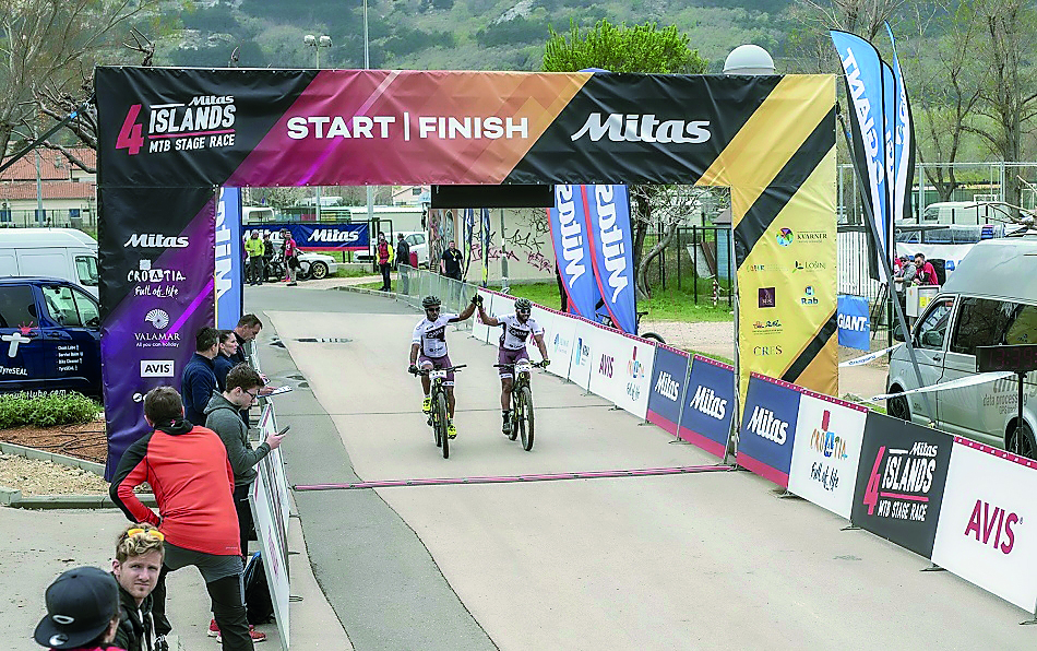 A Qatari pair celebrates after reaching the finish line of  Mitas 4 Islands MTB Race in Zagreb on Sunday.  