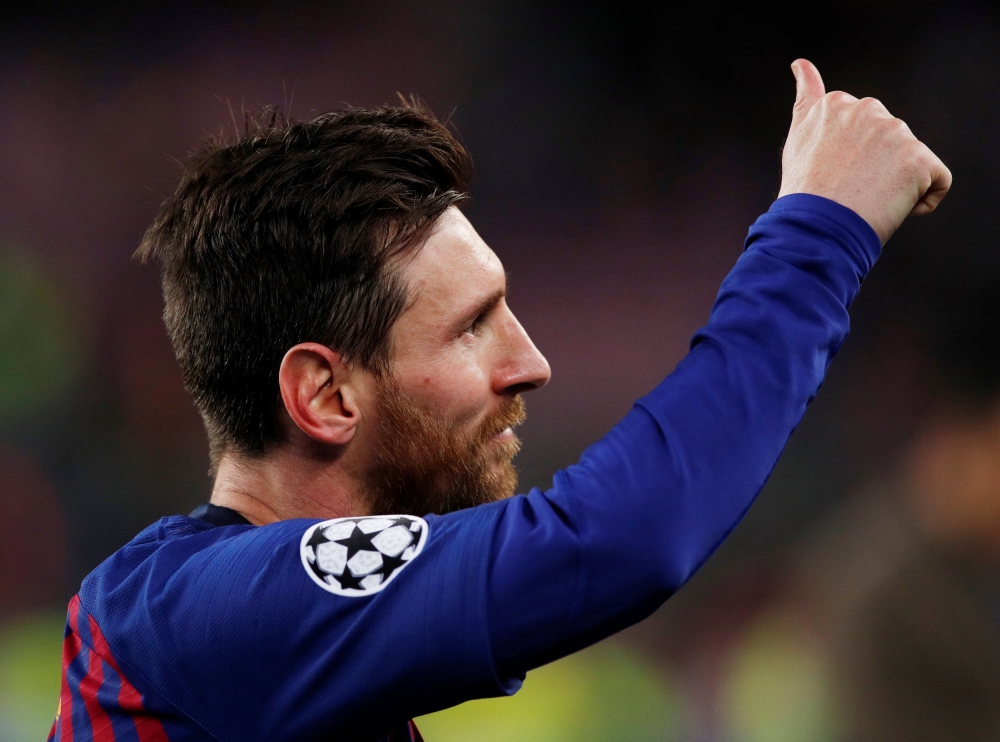 Barcelona's Lionel Messi gestures after the match. Reuters/Albert Gea
