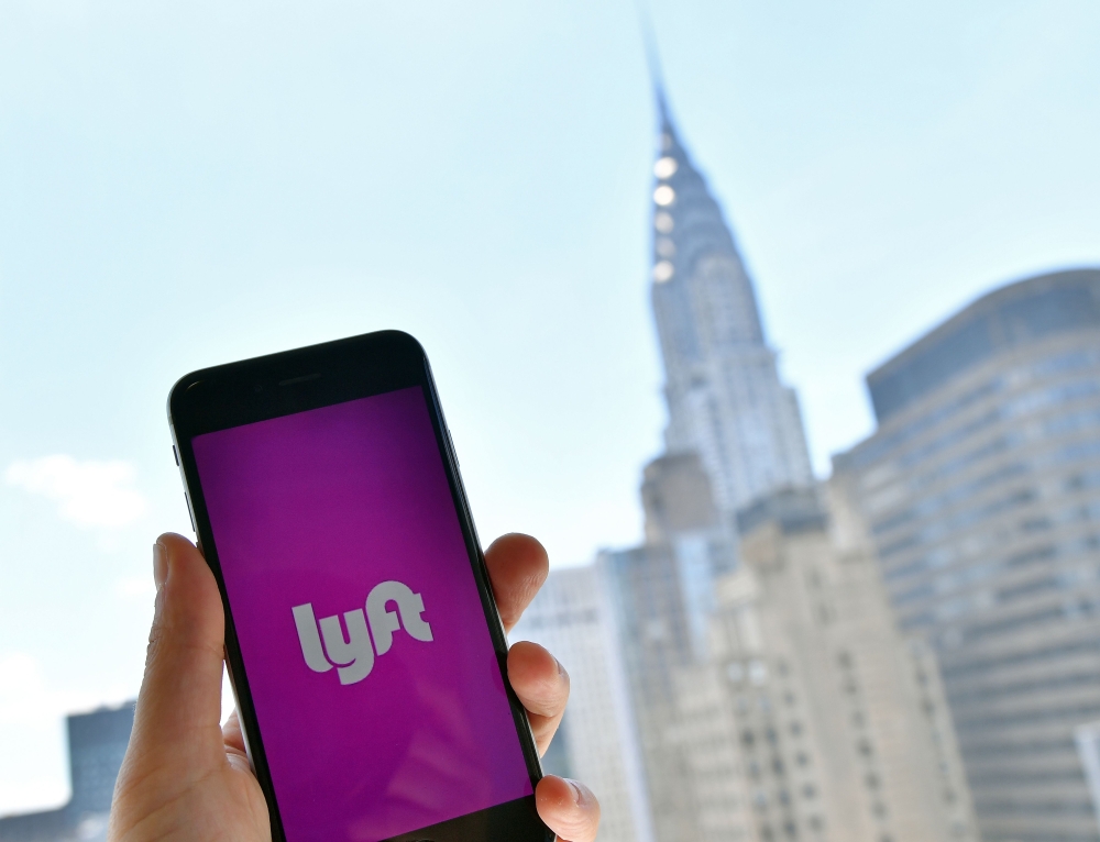 Lyft transport application is seen on a smartphone in New York City in this file photo taken on June 29, 2018. AFP/Angela Weiss