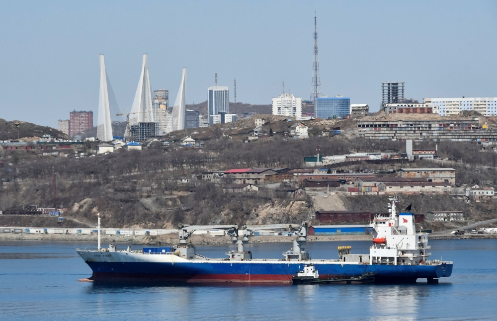 A vessel sails with backdrop of the Russian far-eastern city of Vladivostok, Russia, April 19, 2019. Reuters/Yuri Maltsev 