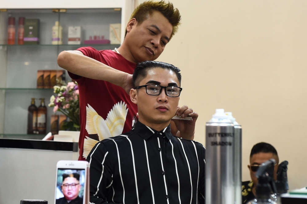 Representative image: Vietnamese man Nguyen Huu Thien gets a Kim Jong Un style haircut at a saloon in Hanoi on February 20, 2019. AFP/Nhac Nguyen
