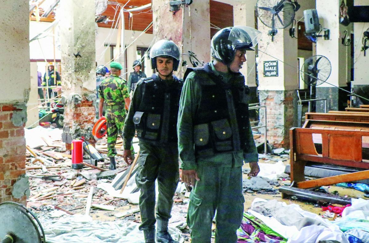 Security forces inspect the St. Anthony's Shrine after an explosion hit St Anthony's Church in Kochchikade in Colombo, Sri Lanka on April 21, 2019. (Chamila Karunarathne/Anadolu Agency)