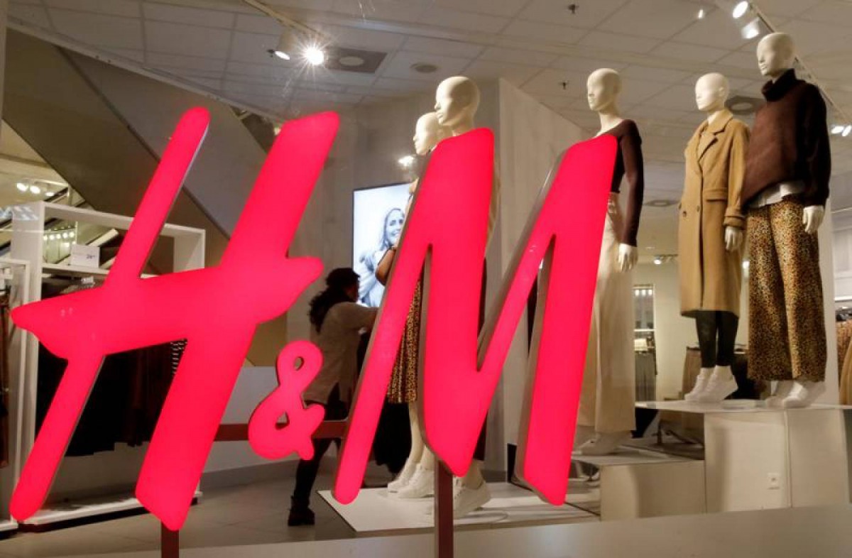 The logo of H&M is seen in a display window of a store in Zurich, Switzerland January 7, 2019. Reuters/Arnd Wiegmann