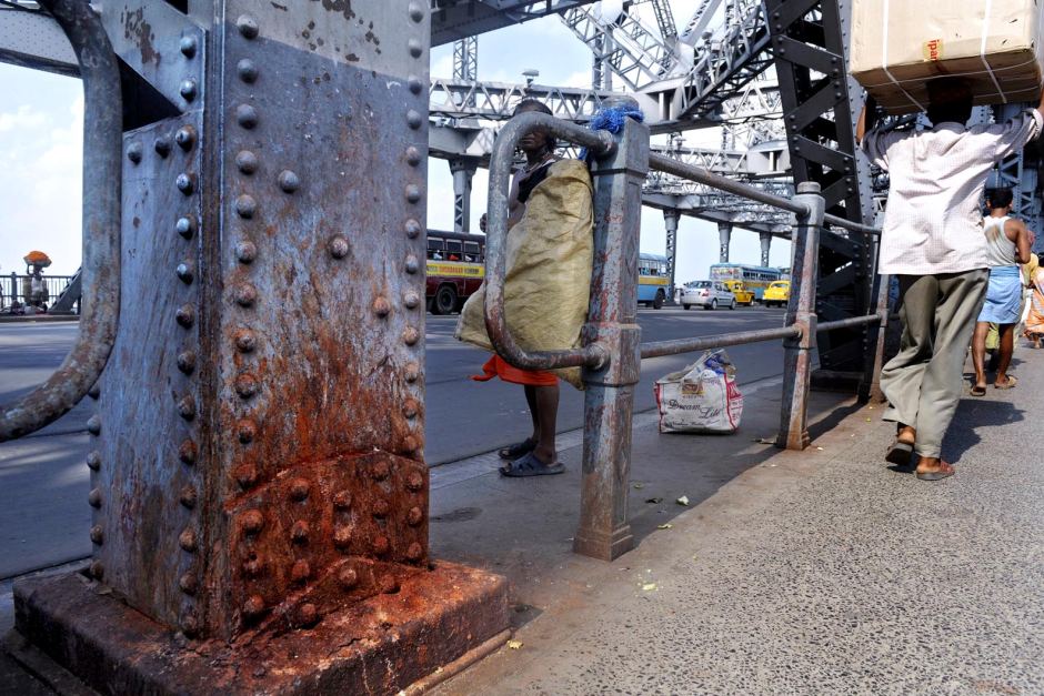A 2011 file photo taken at Howrah Bridge in Kolkata whose steel at its was then reported being corroded by human saliva. AFP/ Deshakalyan Chowdhury