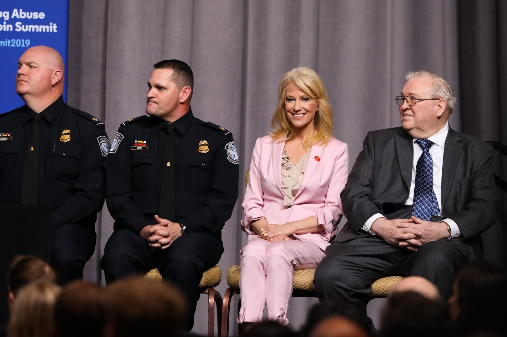 Kellyanne Conway, Counselor to the President, listens to President Donald Trump speak at the Rx Drug Abuse & Heroin Summit on April 24, 2019 in Atlanta, Georgia. Jessica McGowan/Getty Images/AFP 