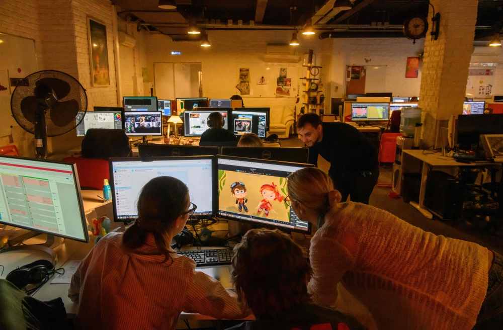 Employees work at the state-owned Parovoz animation studio in Moscow on February 1, 2019, which, with its Netflix contracts, is at the forefront of a resurgence of the country's animation industry. AFP / Mladen Antonov
 
