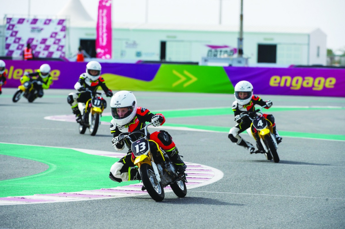 Children taking part in the End Season On Road races at Losail Circuit Sports Club.
