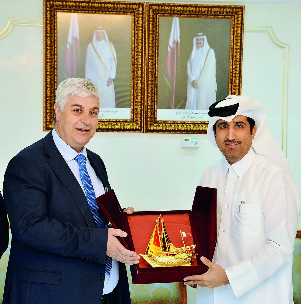 QC Director-General Saleh bin Hamad Al Sharqi (right), presenting a memento to Jordan’s Secretary-General of the Ministry of Labour, Ziad Obeidat, at QC headquarters yesterday.