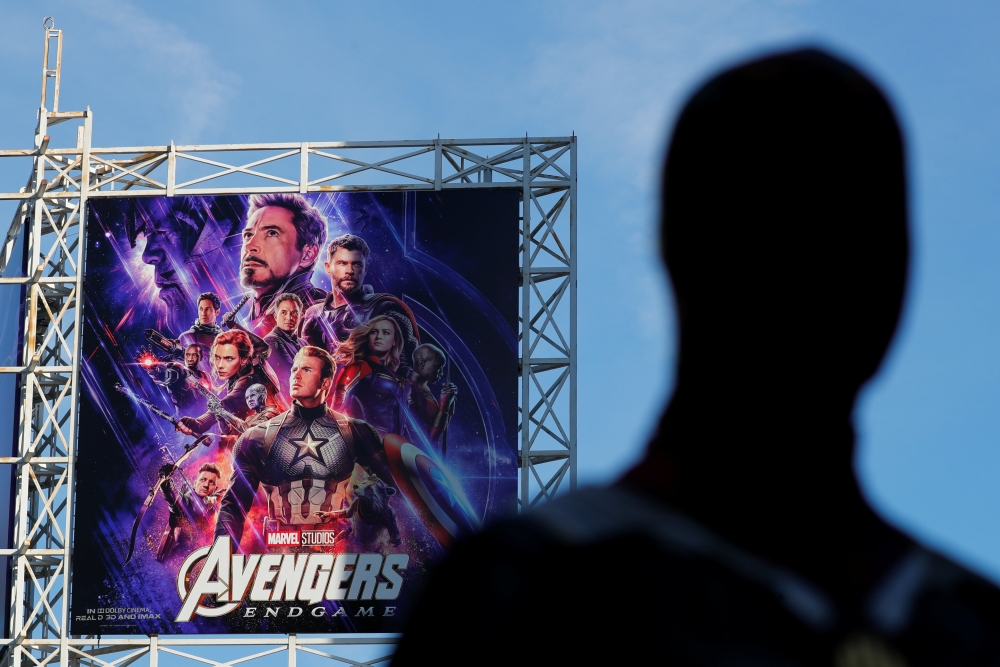 An Avengers fan in costume arrives at the TCL Chinese Theatre in Hollywood to attend the opening screening of 