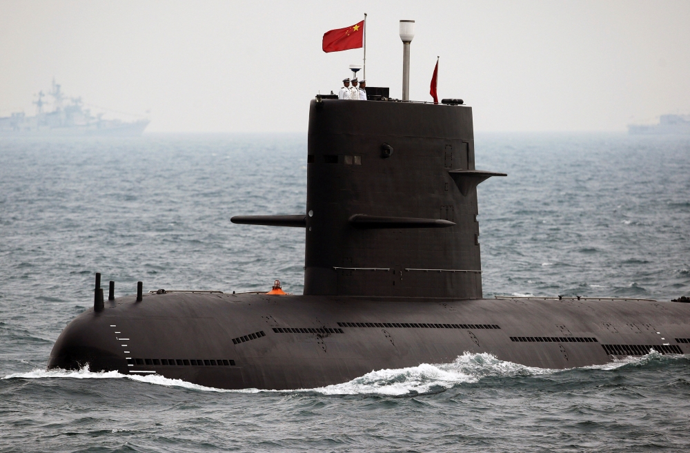A Chinese Navy submarine takes part in an international fleet review to celebrate the 60th anniversary of the founding of the People's Liberation Army (PLA) Navy in Qingdao, Shandong province, China April 23, 2009.  Guang Niu/Pool via Reuters 
