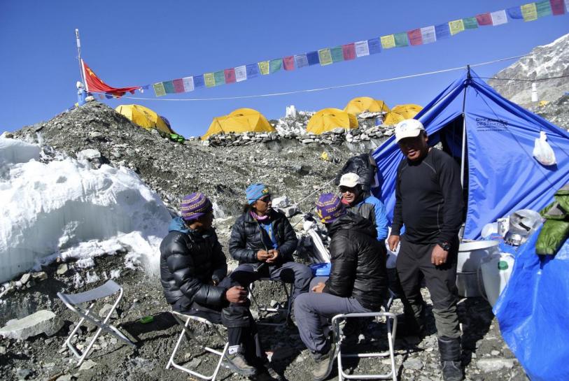 Sherpas sit at the Mount Everest base camp,  April 2014. Reuters / Phurba Tenjing Sherpa