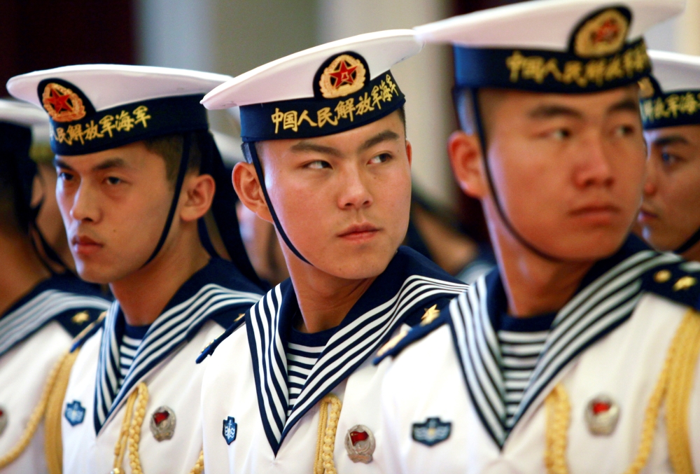 A military honor guard prepares to welcome U.S. Chief of Naval Operations Admiral Jonathan Greenert at the PLA Navy headquarters outside of Beijing, China July 15, 2014.  Stephen Shaver/Pool via Reuters