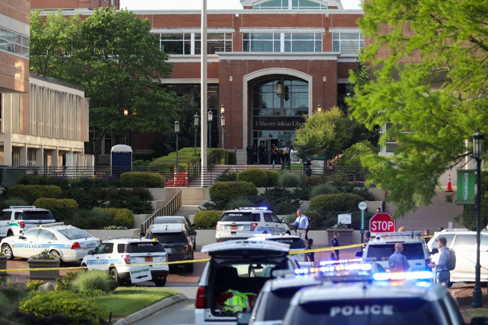 Police keeps the campus on lockdown after a shooting at the University of North Carolina Charlotte in University City, Charlotte, on April 30, 2019. AFP / Logan Cyrus