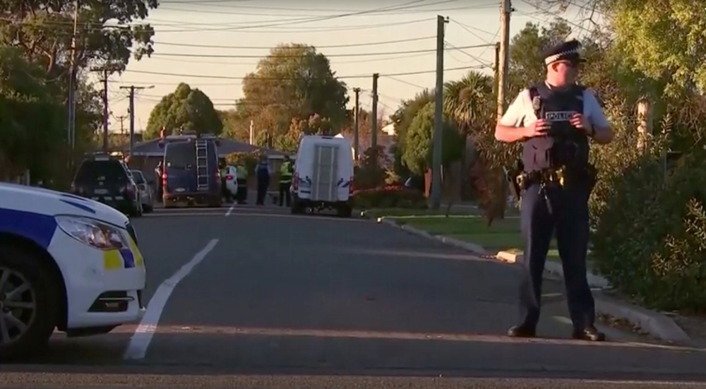Police officers and vehicles are seen behind police cordon, in Christchurch, New Zealand in this still image taken from video April 30, 2019. TVNZ via Reuters TV