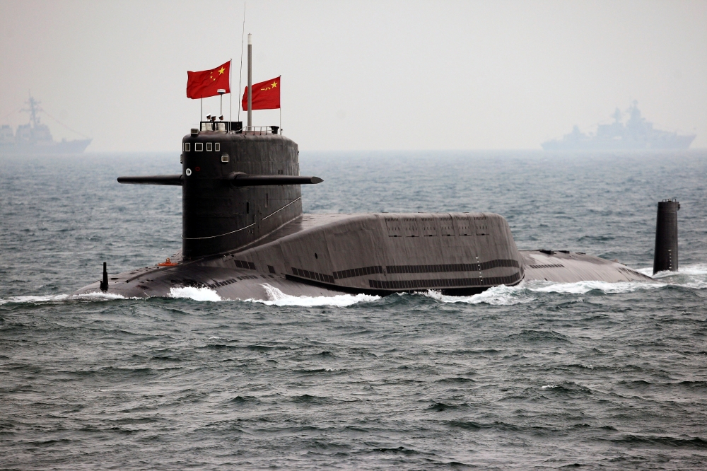 A Chinese Navy nuclear submarine takes part in an international fleet review to celebrate the 60th anniversary of the founding of the People's Liberation Army Navy in Qingdao, Shandong province April 23, 2009.  Guang Niu/Pool via Reuters
 