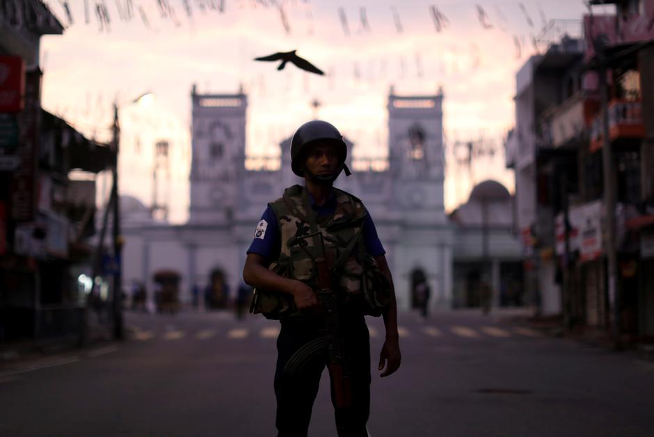 A security officer stands guard outside St. Anthony's Shrine, days after a string of suicide bomb attacks on churches and luxury hotels across the island on Easter Sunday, in Colombo, Sri Lanka April 26, 2019. REUTERS/Athit Perawongmetha 