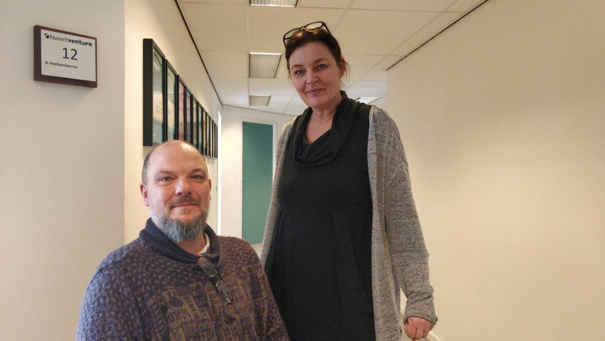 Lars Holstein, in a wheelchair, (left) and Jeanett Dian Amonsen (right), employees at Huset Venture, a Danish social enterprise which hires people with disabilities, pose at their office in Aarhus, Denmark on Mar 19, 2019. Thomson Reuters Foundation/Thin 