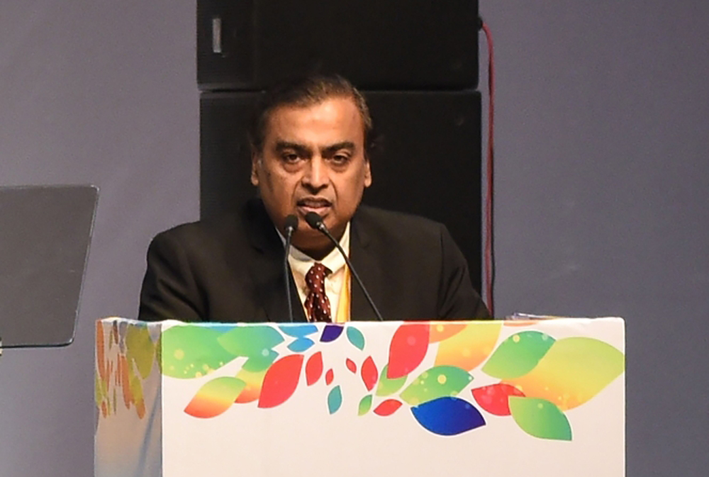 FILE PHOTO: Indian business magnate, chairman and managing director of Reliance Industries Mukesh Ambani speaks at the Vibrant Gujarat Global Summit being held in Gandhinagar.  AFP / SAM PANTHAKY
