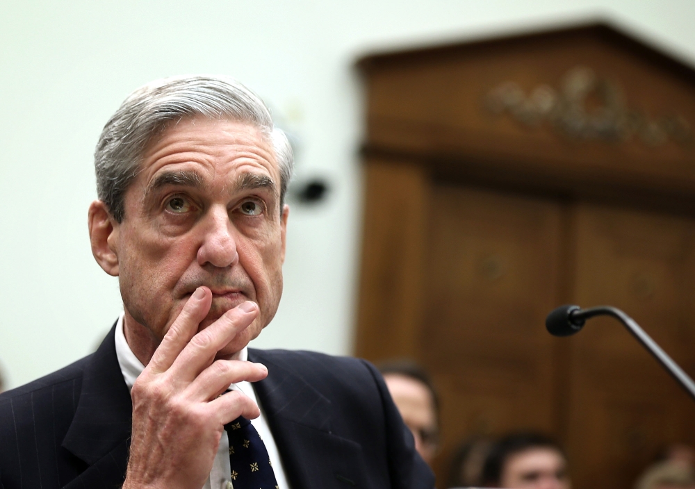 (FILES) In this file photo taken on June 12, 2013, then Federal Bureau of Investigation Director Robert Mueller testifies during a hearing before the House Judiciary Committee on Capitol Hill in Washington, DC.  AFP / GETTY IMAGES NORTH AMERICA / ALEX WON