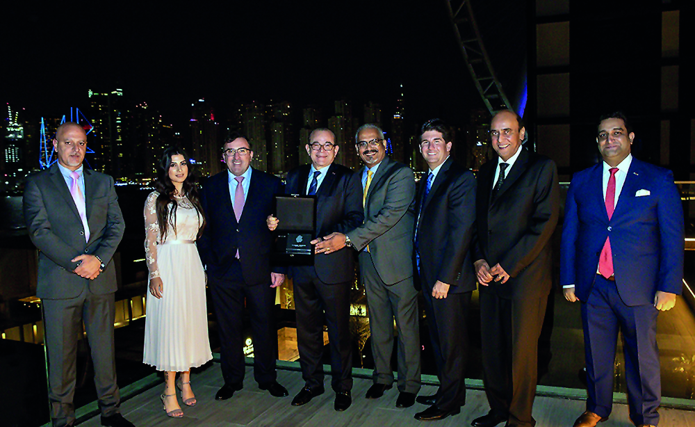 Mohamed Helmy, Group General Manager, Automotive, at Mannai Corporation, and other officials at the award ceremony. 