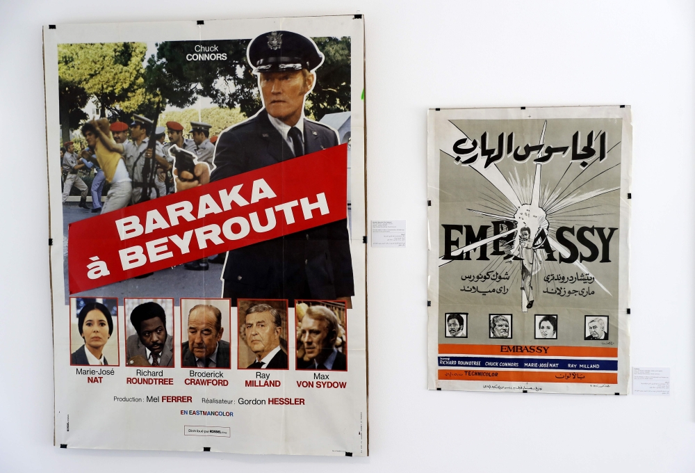 Vintage cinema posters are displayed at an art exhibition in the Lebanese capital Beirut on April 23, 2019.  AFP / Joseph Eid 