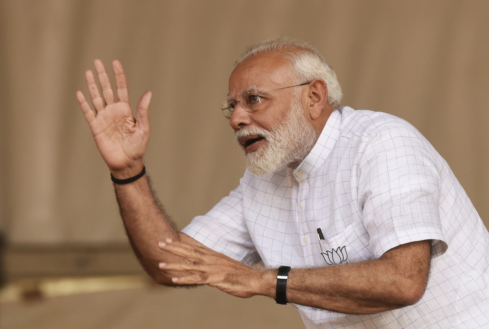 Indian Prime Minister Narendra Modi gestures during a campaign rally ahead of the national elections in Kolkata on April 3, 2019. AFP/Dibyangshu Sarkar