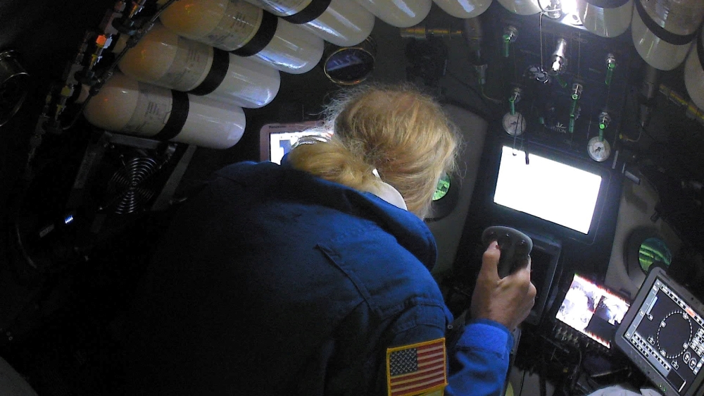 Undersea explorer Victor Vescovo pilots the submarine DSV Limiting Factor in the Pacific Ocean's Mariana Trench in an undated still image from video released by the Discovery Channel May 13, 2019