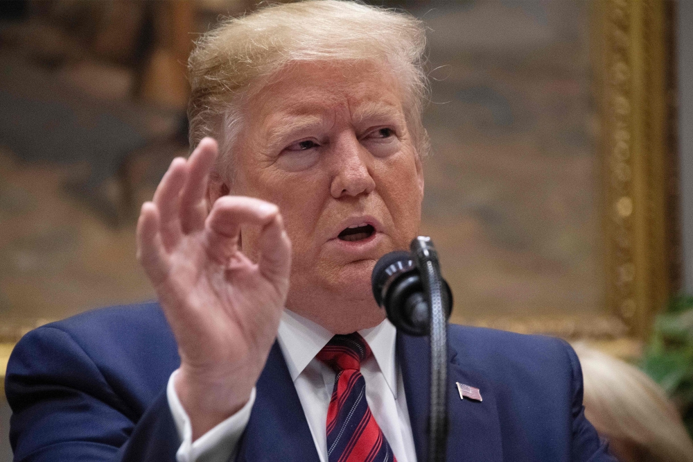 FILE PHOTO: US President Donald Trump speaks during event on ending surprise medical billing at the White House in Washington, DC. AFP / Jim WATSON

