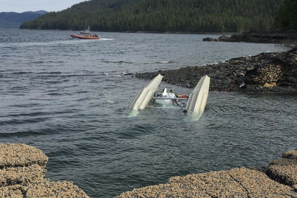 U.S. Coast Guard crew searches for survivors from downed aircraft in the vicinity of George Inlet near Ketchikan, Alaska, U.S., May 13, 2019. Picture taken May 13, 2019. Photo by Ryan Sinkey/U.S. Coast Guard/Handout via Reuters