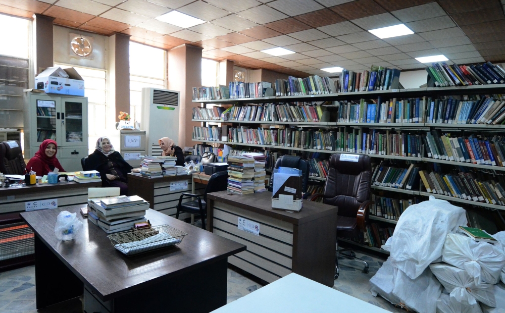 Iraqi women sit at the new library of Mosul University in Iraq's northern city of Mosul on April 17, 2019.  AFP / Zaid Al-Obeidi 