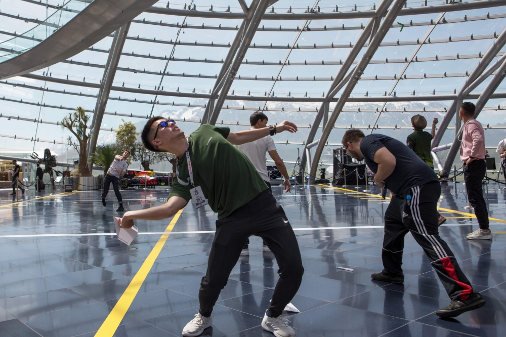 A participant in the Red Bull Paper Wings World Finals 2019 competes in Salzburg, Austria on May 17, 2019. AFP / ALEX HALADA 