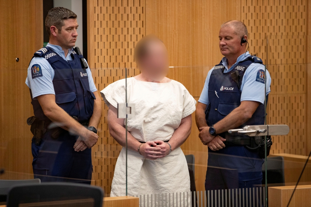 File photo of Brenton Tarrant, charged for murder in relation to the mosque attacks, is seen in the dock during his appearance in the Christchurch District Court, New Zealand March 16, 2019. Mark Mitchell/New Zealand Herald/Pool via REUTERS/File Photo