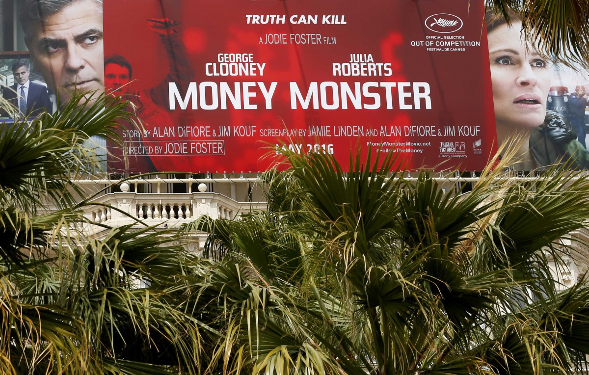 A poster for the film ‘Money Monster’ is displayed outside the Carlton hotel before the start of the 69th Cannes Film Festival in Cannes, May 9, 2016. Reuters/Yves Herman