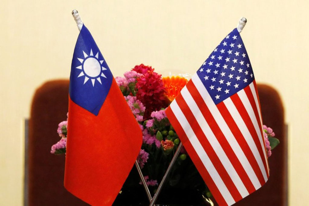 File photo og flags of Taiwan and U.S. are placed for a meeting between U.S. House Foreign Affairs Committee Chairman Ed Royce speaks and with Su Chia-chyuan, President of the Legislative Yuan in Taipei, Taiwan March 27, 2018. REUTERS/Tyrone Siu
