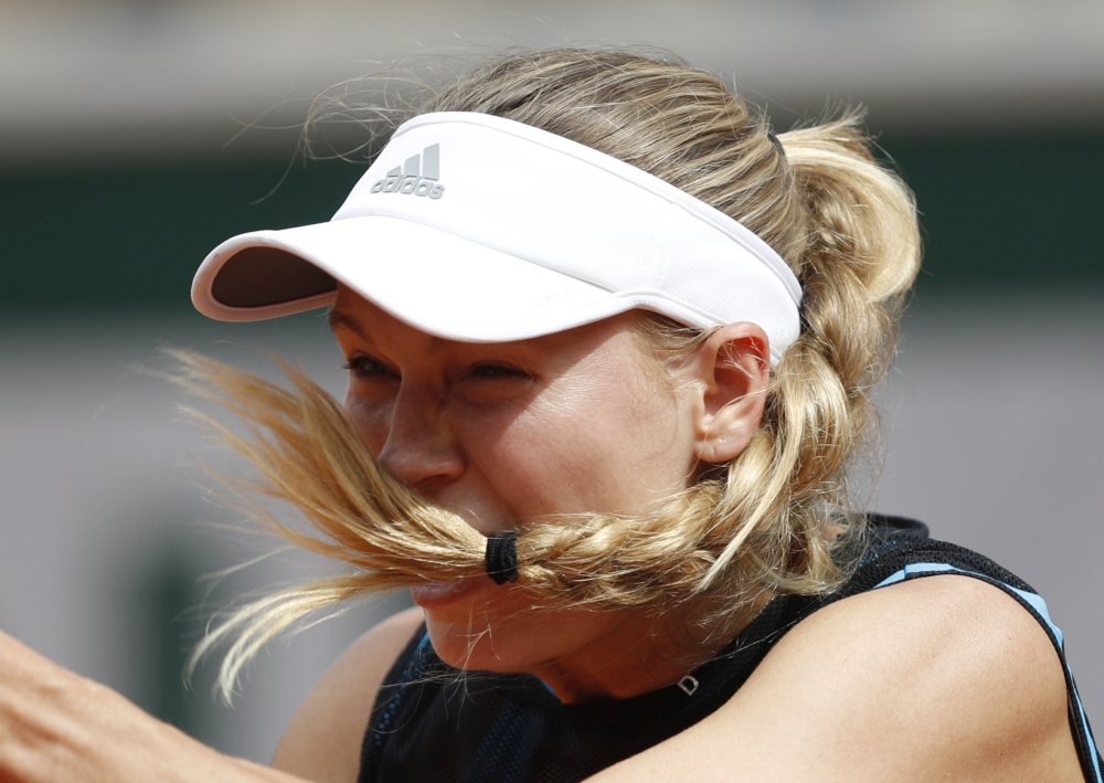 Denmark's Caroline Wozniacki in action during her first round match against Russia's Veronika Kudermetova. REUTERS/Vincent Kessler