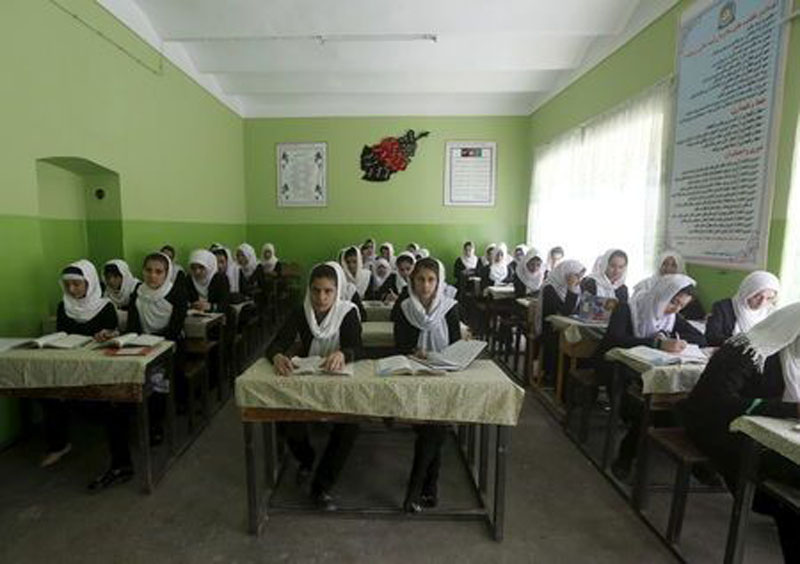 File photo of Class 11 Afghan girl students attend a class at Zarghona high school in Kabul, Afghanistan, August 15, 2015. REUTERS/Omar Sobhani